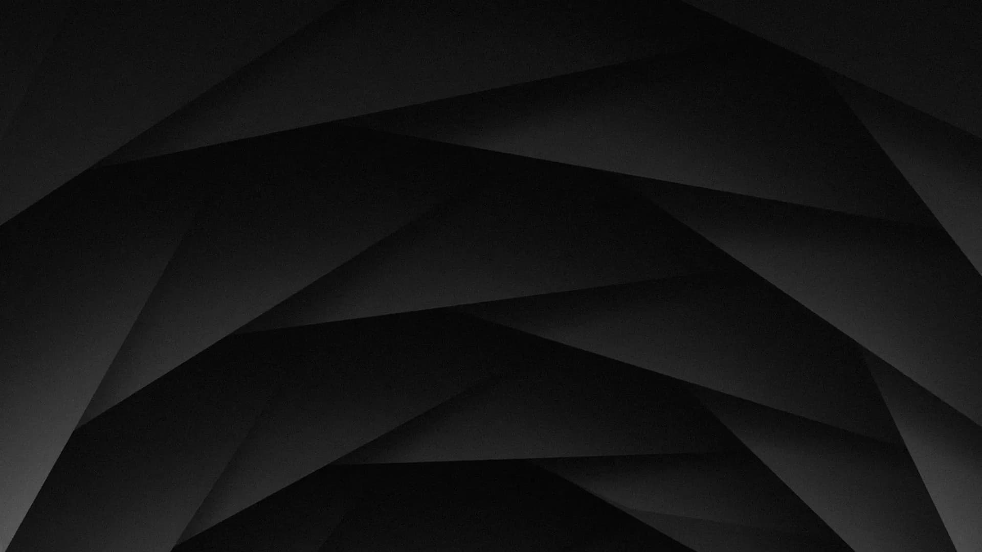 Dark abstract geometric background with layered triangular shapes