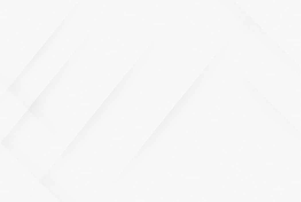 Abstract white geometric background with soft, diagonal lines.