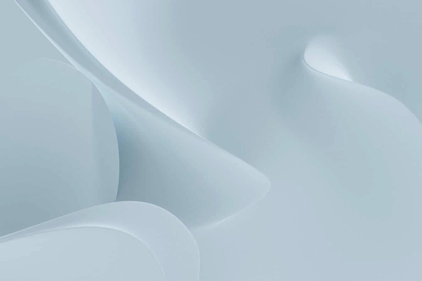 Minimal abstract light blue shapes representing fluid design, aesthetics, and user interface concepts.