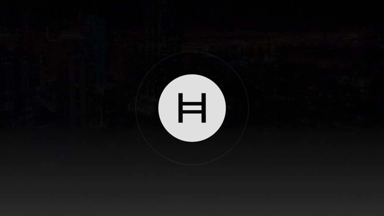 Hedera HBAR icon on a dark grey background with a subtle circular interface overlay.