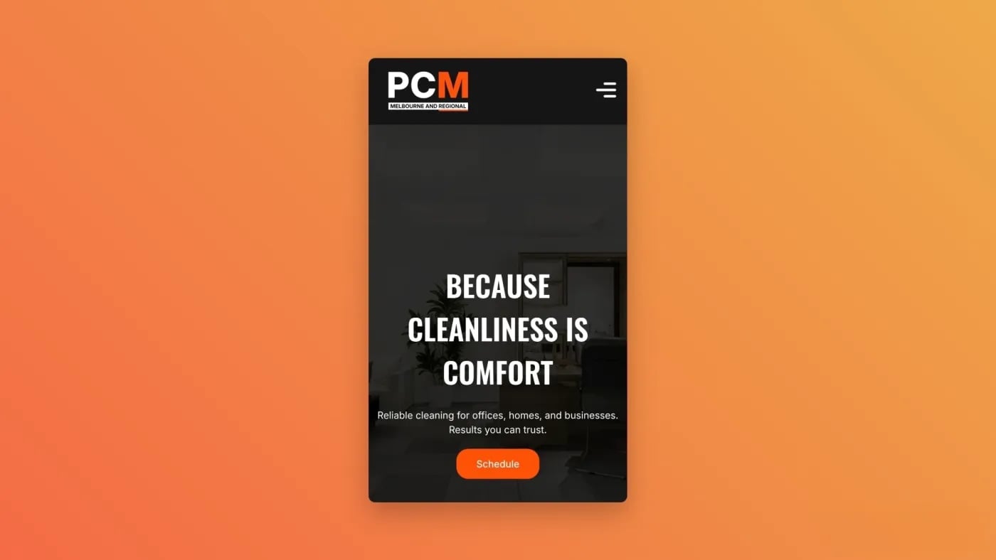 Mobile view of the PCM & Regional website showing the black and orange design demonstrating responsive design and consistent branding across devices.