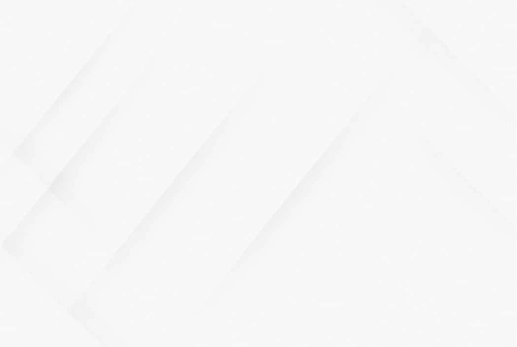 Abstract white geometric background with soft, diagonal lines.