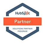 HubSpot Rubix Studios and HubSpot partnership badge.