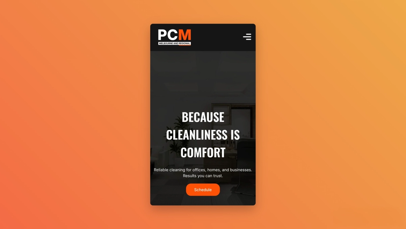 Mobile view of the PCM & Regional website showing the black and orange design demonstrating responsive design and consistent branding across devices.
