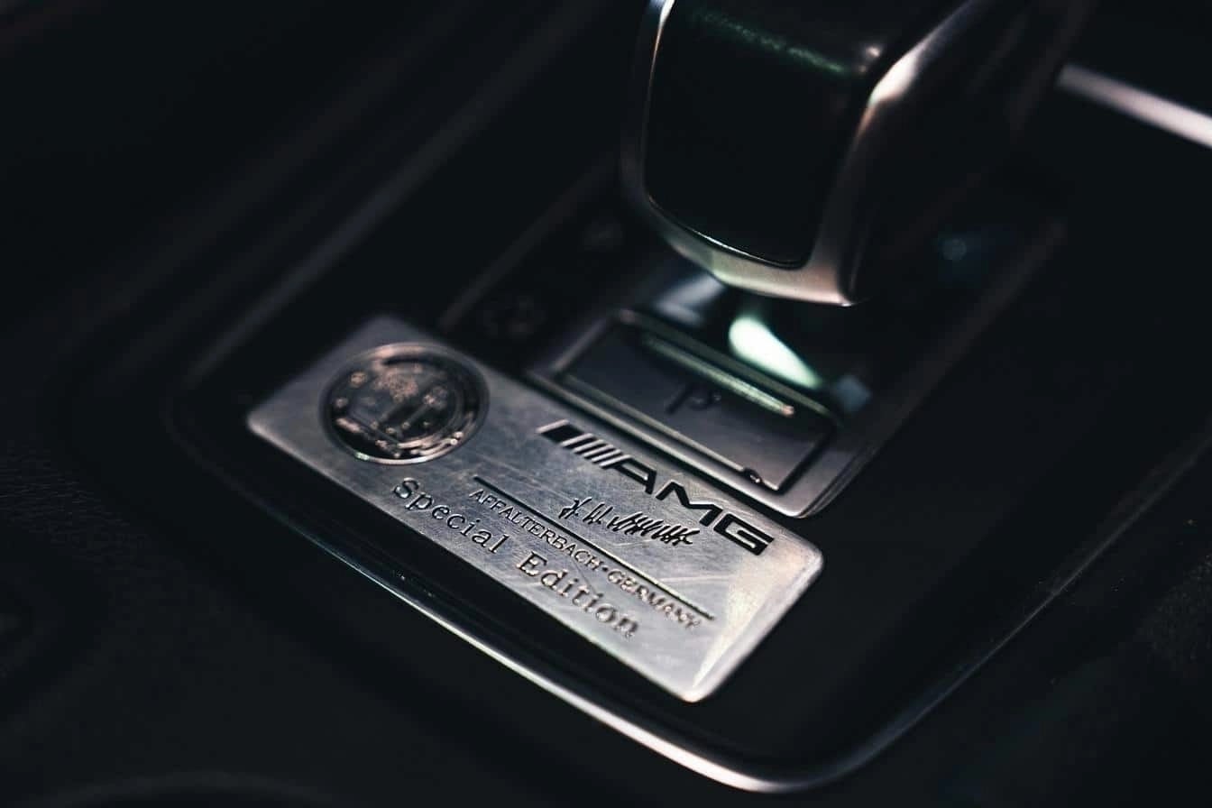 Close-up of a special edition Mercedes-Benz AMG gear shift with a metallic plaque displaying the AMG logo and 'Special Edition' text.